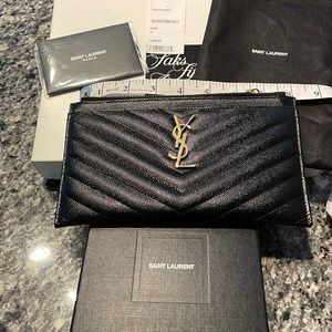 YSL Wallet pouch barely used In mint condition